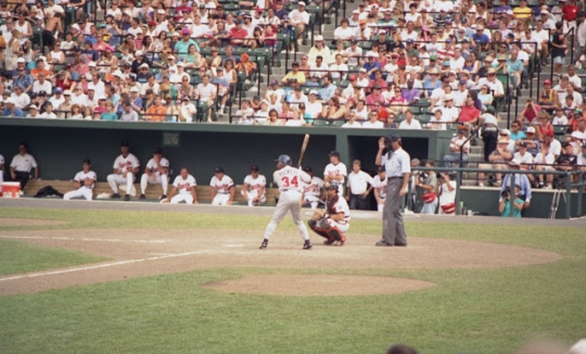 Color image of Kirby Puckett batting against the Baltimore Orioles during a game at Camden Yards.