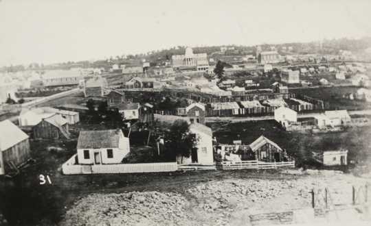 Black and white view of St. Paul looking toward the first capitol building, 1857. Photographed by Edward Augustus Bromley.