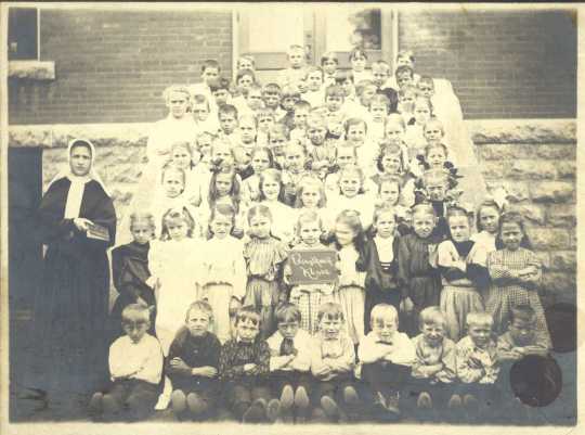 Students of St. Stanislaus School with their teacher