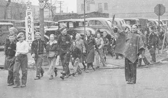 The children of Franklin School being escorted across the street by school police, St. Paul.