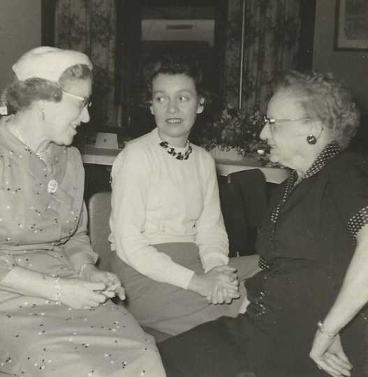 Black and white photograph of a BPW club breakfast, September 22, 1957. Picture (left to right) are Frances Engebretson, Peggy Running, and Sue Monroe.