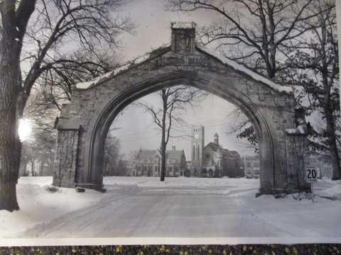 Black and white photograph of Shattuck School, Faribault, c.1949. The arch and Shumway, designed in 1886, and Morgan Refectory designed in 1888. 