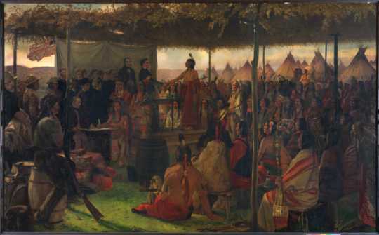Color image of a painting of the Treaty of Traverse des Sioux, c.1905. Oil painting by Francis Davis Millet.  