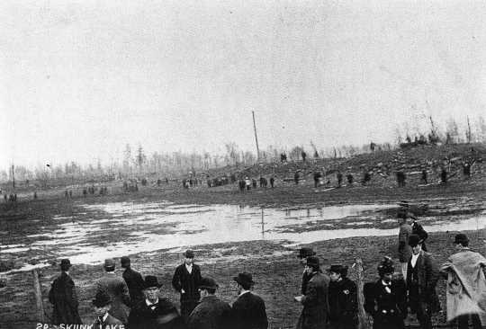 People gather at Skunk Lake after the Hinckley Fire, which occurred on September 1, 1894. Photograph Collection, Hinckley Fire Museum, Hinckley.