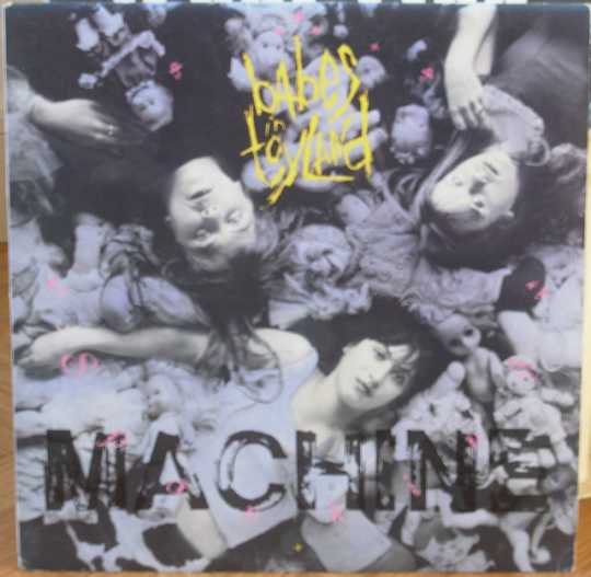 The cover of Babes in Toyland’s 1991 debut album, Spanking Machine. The photograph on the sleeve shows (clockwise, left to right) Lori Barbero, Kat Bjelland, and Michelle Leon.