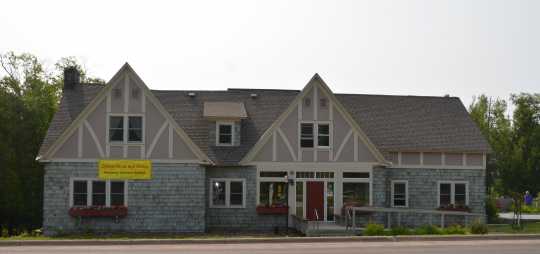 Color image of Stickney Inn and Store, north elevation, facing south, July 2014. Photographed by Amy Lucas.