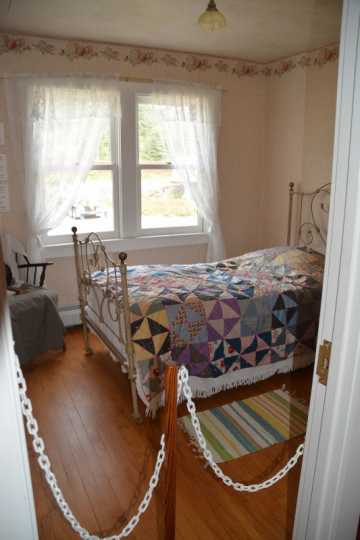 Color image of Stickney Inn and Store, second floor bedroom, facing northeast, July 2014. Photographed by Amy Lucas.