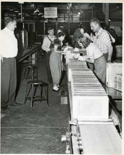 Workers on the factory line at the Twin Cities Ordnance Plant