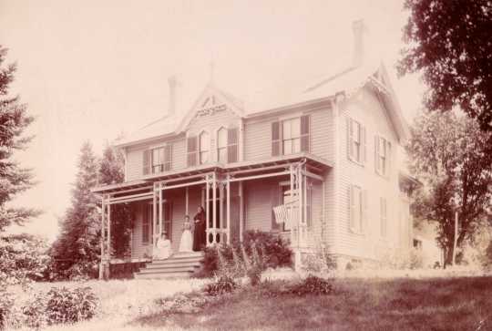This photograph shows the house as it was originally built, with the front porch seen here facing west. Photograph by Fowler View Company, ca. 1898. Anoka County Historical Society, object ID# 3000.1.5.