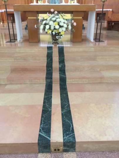 Floor decoration honoring Father Michael J. Casey