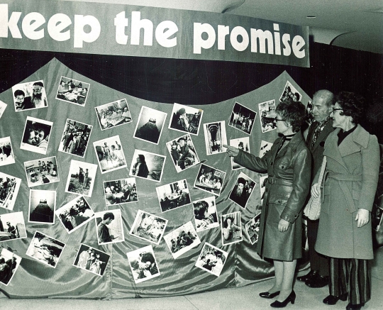 Black and white photograph of a photo collage display made by the United Jewish Federation Council, undated. 