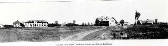 Black and white photograph of the Northwest Experiment Station and Northwest School of Agriculture grounds and buildings,1910.  