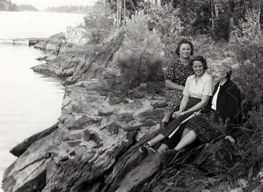 Black and white photograph of Frances E. Andrews (far right) and two other women, ca. mid-1950s.