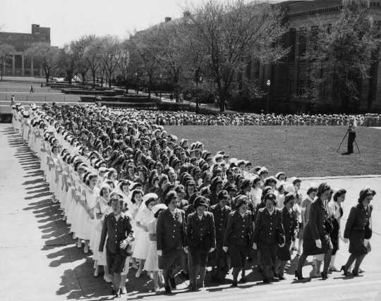 Minnesota Cadet Nurse Corps marching into Northrup Auditorium