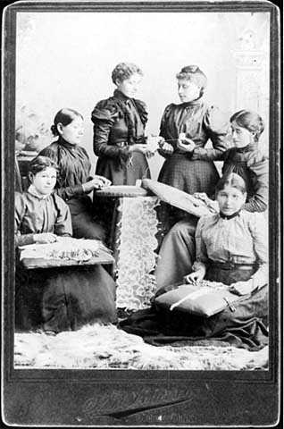photograph of lace makers and their lace
