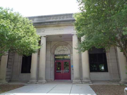 Color image of the front entrance of Como Park Elementary School, designed by Clarence Wigington and built in 1916. Photographed by Paul Nelson on August 5, 2014.