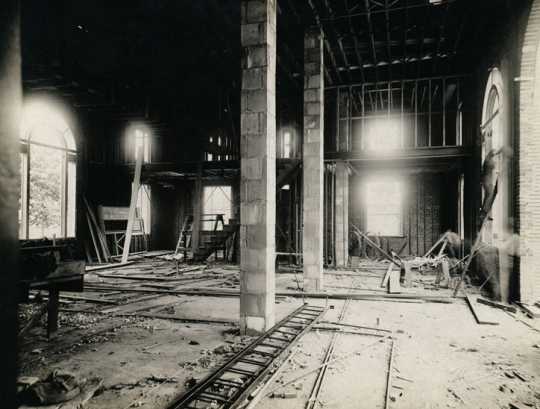 Black and white photograph of the lobby of the Anoka Post Office during construction, looking west, March 1, 1917.