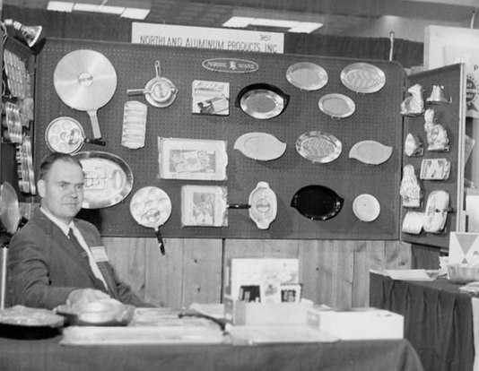 Black and white photograph of H. David Dalquist, ca. 1955, at a first Chicago Housewares Show—the first in which Nordic Ware participated.