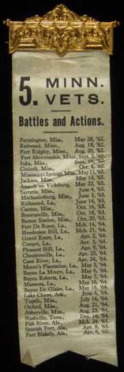 White ribbon with a list of the locations and dates of major battles of the 5th Minnesota Volunteer Infantry.