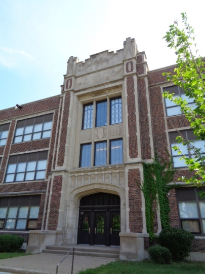 Color image of the front entrance of Marshall Junior High School (now Webster Elementary School) in St. Paul designed by Clarence Wigington and built in 1924 and 1925. Photographed by Paul Nelson on August 15, 2014.