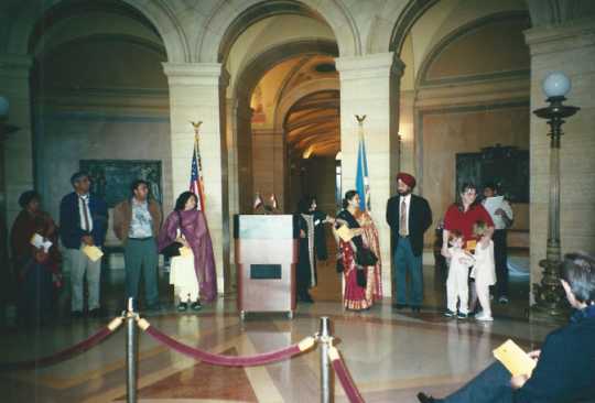 Color image of an interfaith Prayer held in St. Paul on September 11, 2002, at the State Capitol by the India Association of Minnesota to commemorate the terrorist attacks of September 11, 2001.