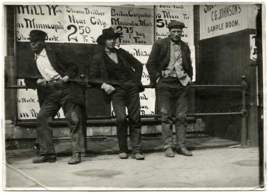Laborers standing outside the Employment Bureau, 1908
