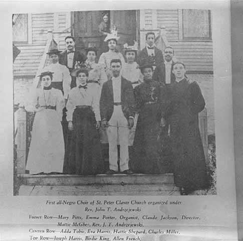 Photograph of church choir members on the steps of St. Peter Claver.