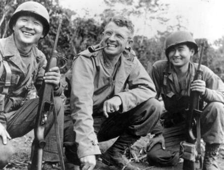 Black and white photograph of General Frank Merrill with Nisei interpreters, c.1945.