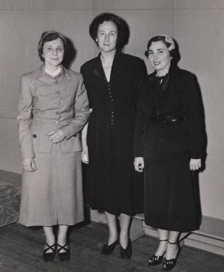 Black and white photograph of Mount Sinai Hospital Association Auxiliary leaders (left to right) Mrs. Louis Gross, Mrs. Charles Penarsky, and Mrs. Sima Meshbesher, 1950.