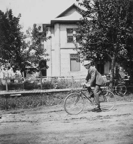 Theodore Palmer on a bicycle