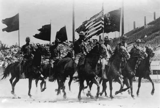 Color bearers of the 151st Field Artillery on parade