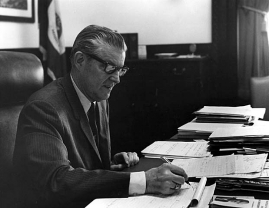 Harold LeVander at his desk