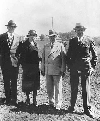 Myrtle Cain with O. W. Behrues, Mike E. Collins, and Floyd B. Olson