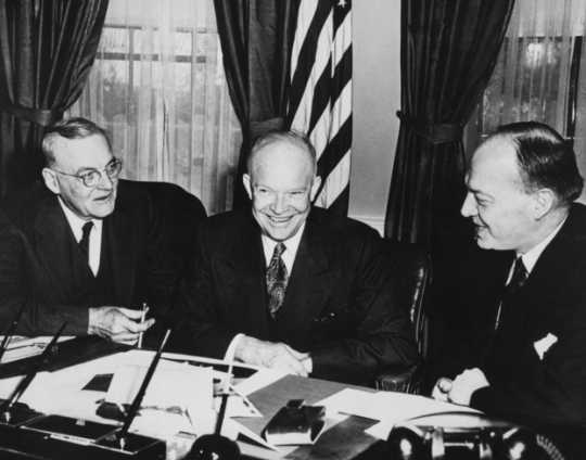 Black and white photograph of Harold E. Stassen, John Foster Dulles, and Dwight D. Eisenhower, c.1953.