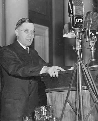 Black and white photograph of Elmer Benson giving a speech, c.1937.