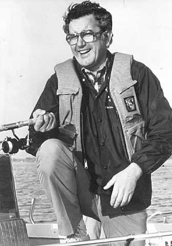 Black-and-white photograph of Minnesota governor Rudy Perpich at the Minnesota fishing opener in June of 1977.
