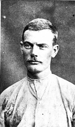 Black and white photograph of Bob Younger after being captured outside Madelia, September 1876.  Photographed by Jacoby’s Art Gallery.