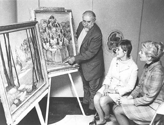 Black and white photograph of Clement Haupers giving a lecture on the St. Croix river, c.1969.