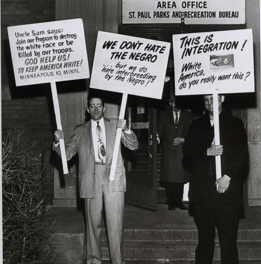 Fair housing protesters from the “Committee to End Discrimination against Fourth Class Whites," December 19, 1962, St. Paul Pioneer Press. Minneapolis and St. Paul Newspaper Negatives Collection, Minnesota Historical Society.