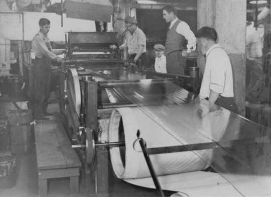 photograph depicting factory production of cellulose tape at 3M around 1931