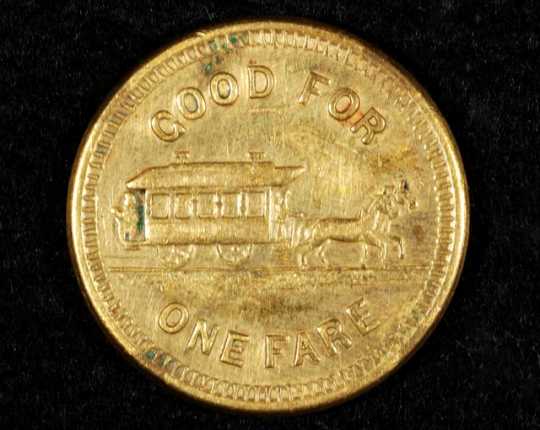 Color image of a Minneapolis Street Railway Company fare token (back), c.1905.
